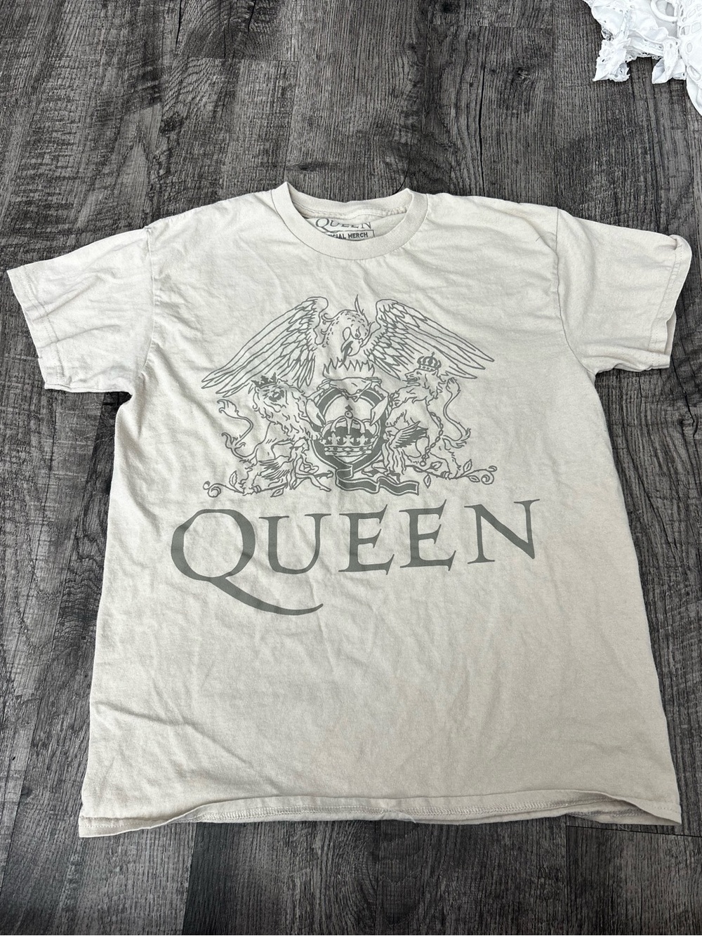 Queen Official Merch Cream Tee with Gray Queen Crest Graphic